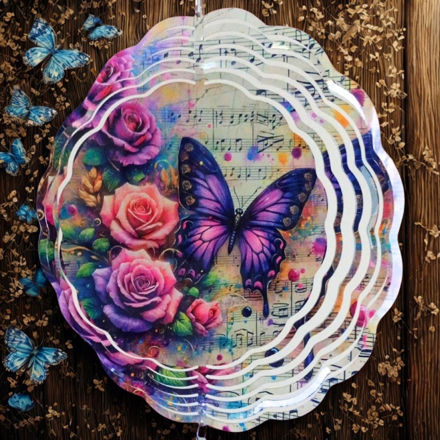 Butterfly on a Music Sheet with Roses wind spinner